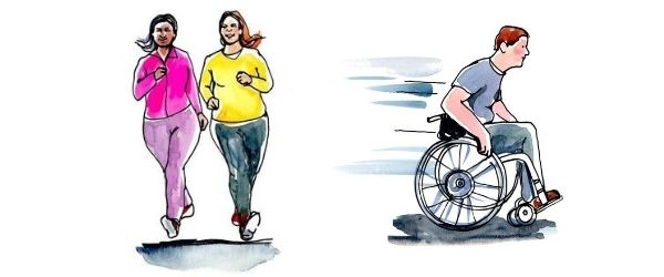 Två kvinnor springer och en man kör rullstol.